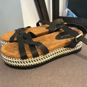 strapped platform sandals. Never worn